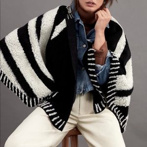 Sherpa striped pullover. Polyester and wool.